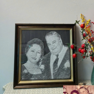 A Handcrafted Portrait Made from Threads, Nails, and Meaning